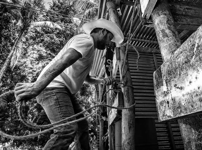 A horseman preparing the Caballo Pinto Stables grounds